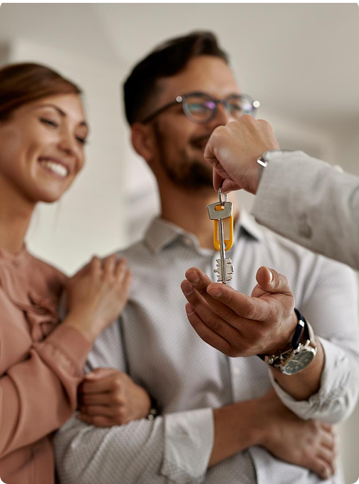 Happy people with keys